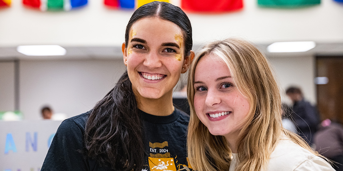 Two female students posing